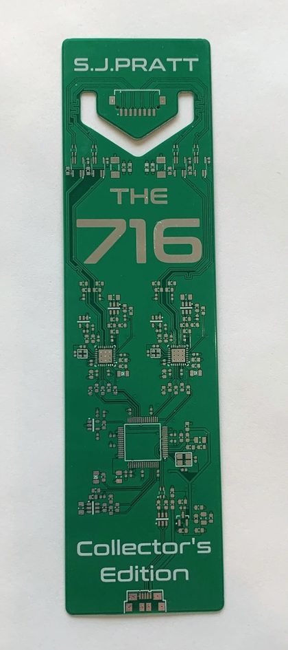 The 716 collector's edition bookmark, a green circuit board with S.J. Pratt and The 716 printed on it